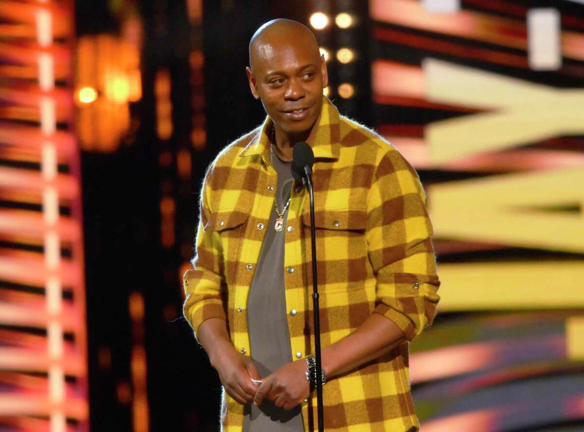 FILE - Dave Chappelle appears during the Rock & Roll Hall of Fame induction ceremony on Oct. 30, 2021, in Cleveland. Chappelle was tackled during a performance at the Hollywood Bowl Tuesday, May 3, 2022. Security guards chased and overpowered the attacker, and Chappelle was able to continue his performance while the man was taken away in an ambulance. (AP Photo/David Richard, File)