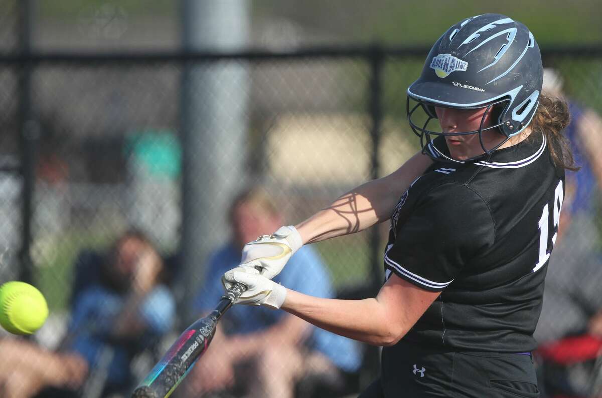 Routt's Cami Hurt sends a pitch to the outfield on an inside-the-park home run against Pleasant Hill in the four-five game of the inaugural WIVC softball tournament at Future Champions in Jacksonville on Monday.