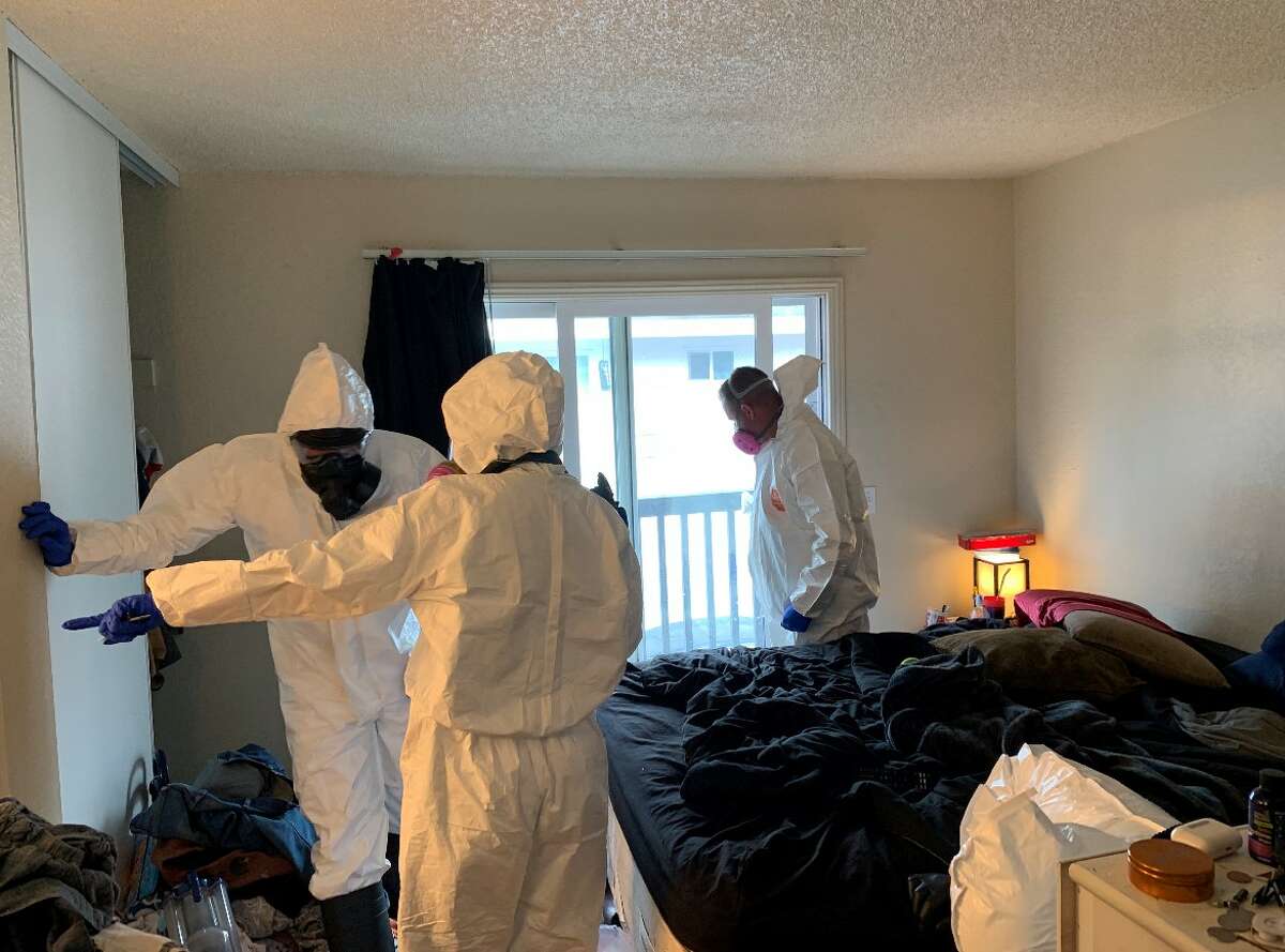 Officials inspect a home in Santa Rosa, Calif., where a toddler was found dead near suspected fentanyl. 
