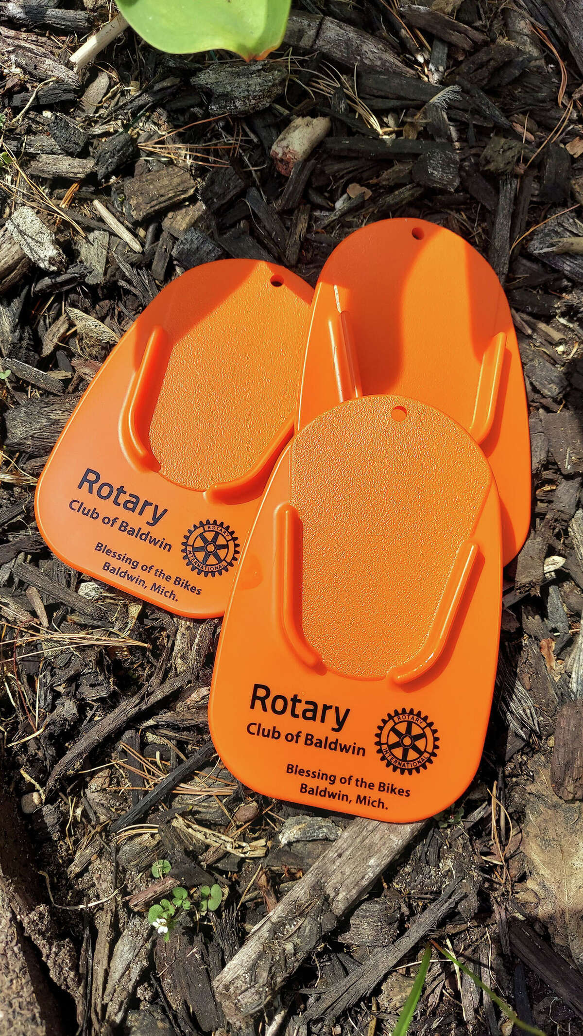 These kickstand coasters with the Baldwin Rotary Club logo will be available this weekend as part of a fundraiser for the club.