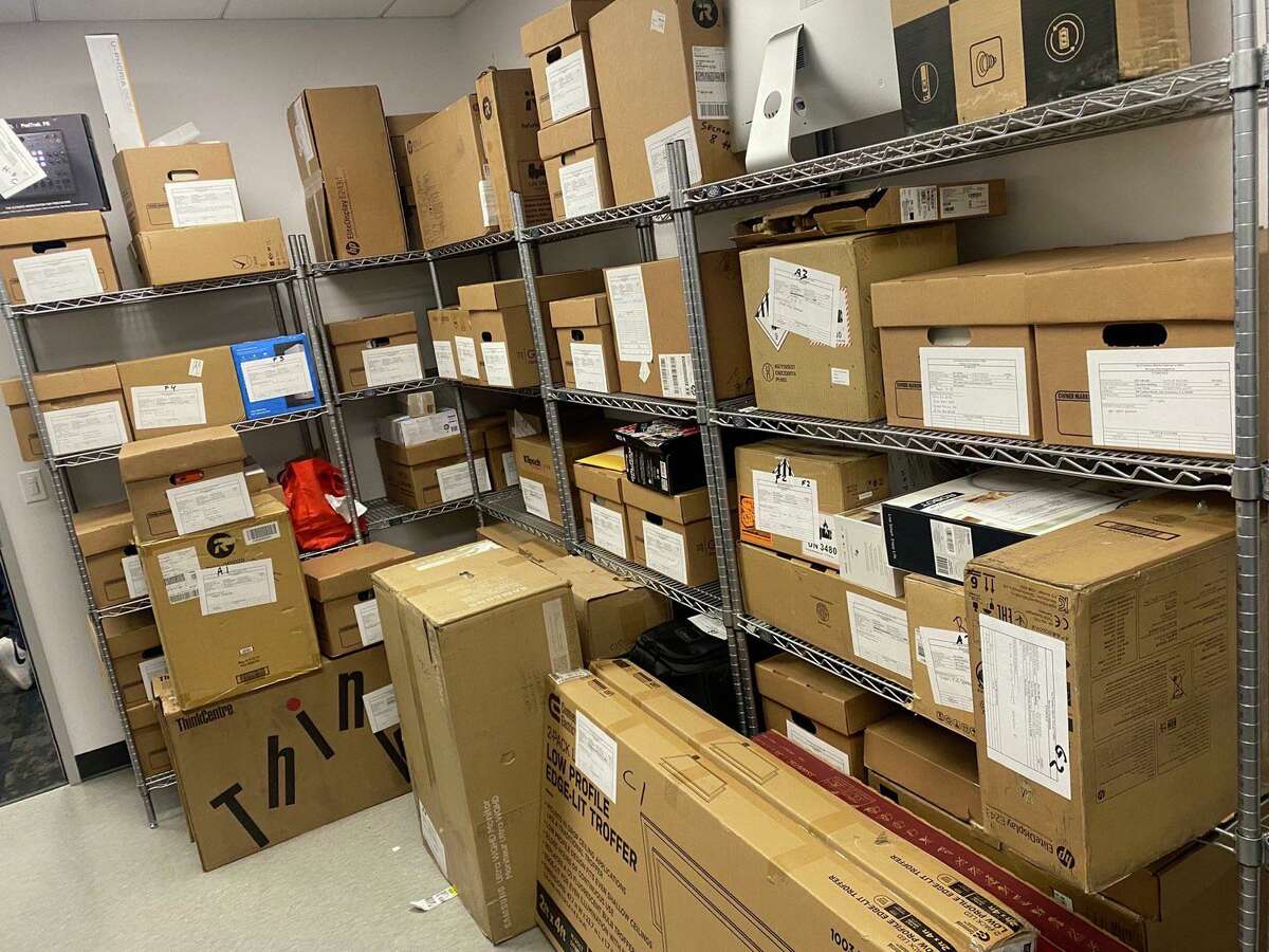 Investigators with the San Francisco District Attorney’s Office confiscated hundreds of allegedly stolen laptops, phones and other devices as part of a sweeping fencing operation. The devices, which are stored in these boxes, are being cataloged and will be returned to their owners.