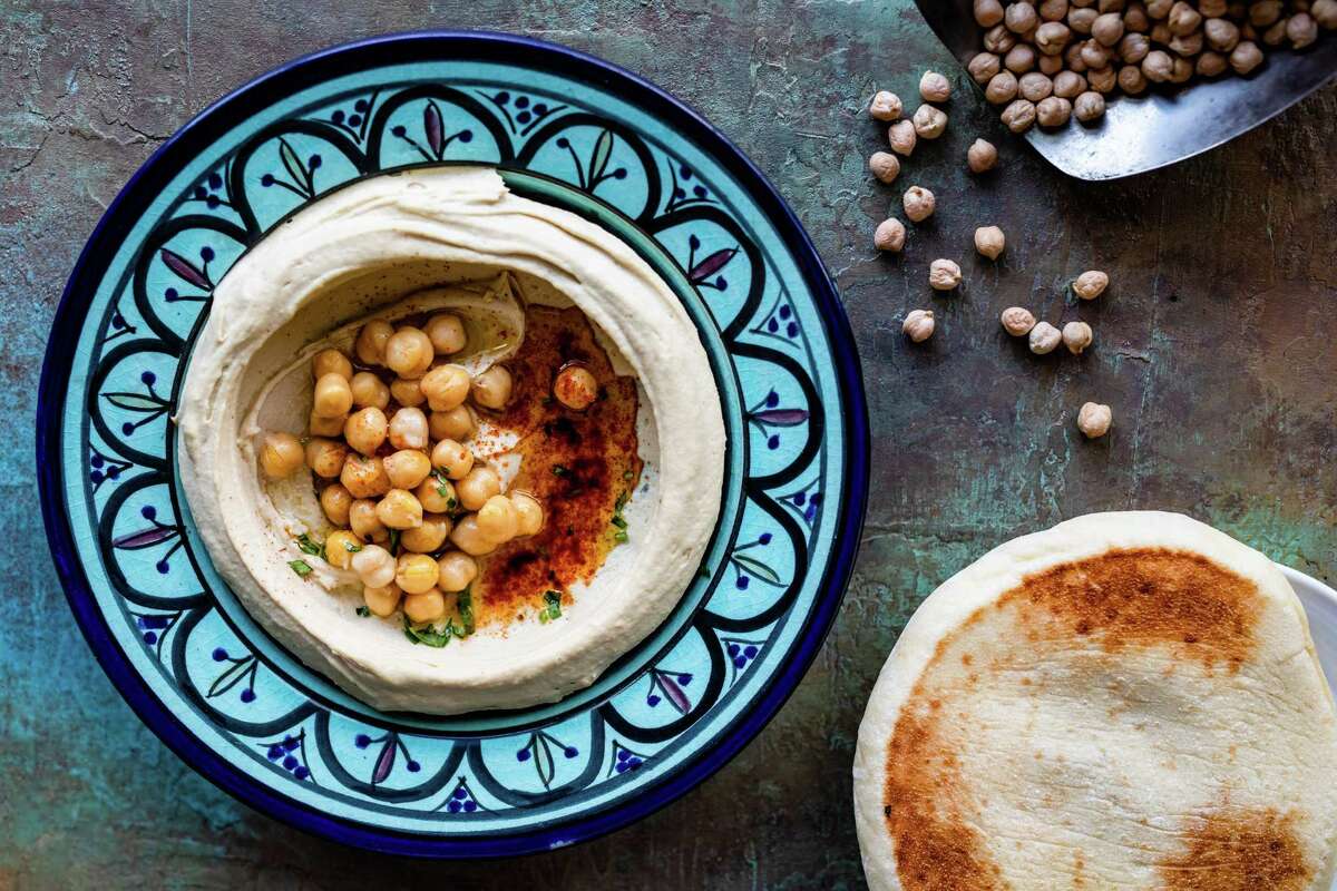 Hummus and fresh pita at Hamsa, the new modern Israeli restaurant in Rice Village.