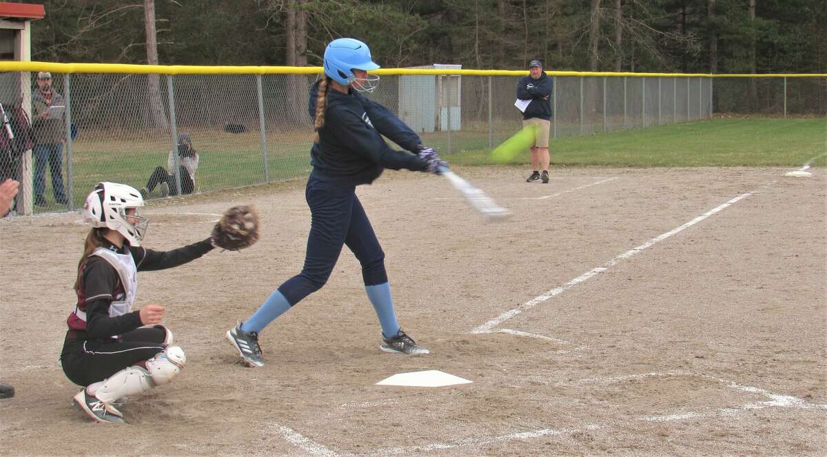 Brethren freshman Stella Estes connects with a pitch for a base hit against Marion on Monday, May 2 at Brethren High School
