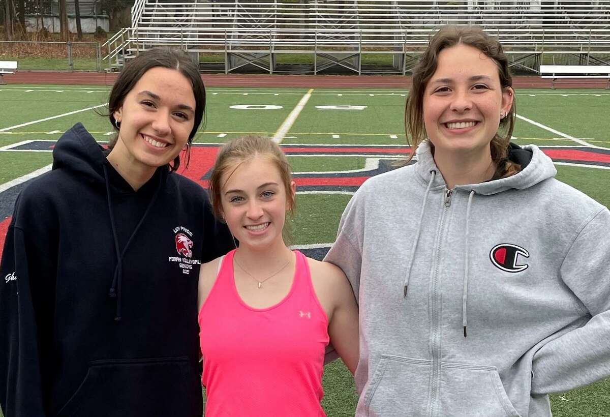 Arezoo Ghazagh, Quincy Ercanbrack and Katharine Harrison captain the Foran girls track team.