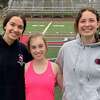 Arezoo Ghazagh, Quincy Ercanbrack and Katharine Harrison captain the Foran girls track team.