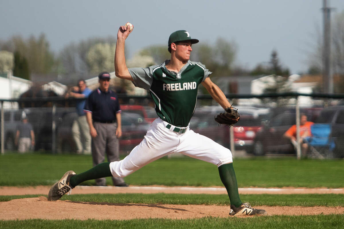 Freeland's Alex Duley throws out a pitch during a game against Essexville Tuesday, May 10, 2022 at Freeland High School.