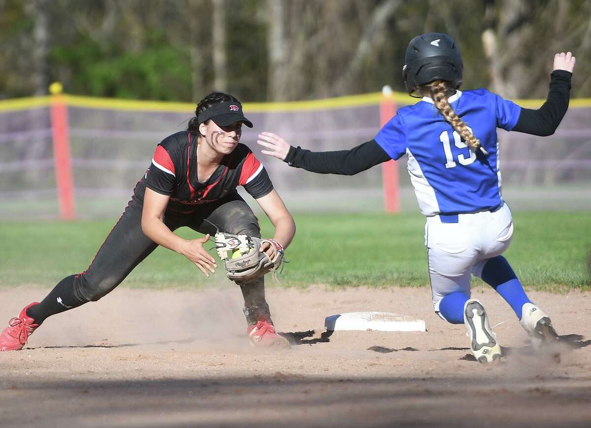 Masuk shortstop Julie Bacoulis tags out Southington's Emily Moskal trying to steal second base during the first inning of their girls softball game at Masuk High School in Monroe, Conn. on Tuesday, May 10, 2022.