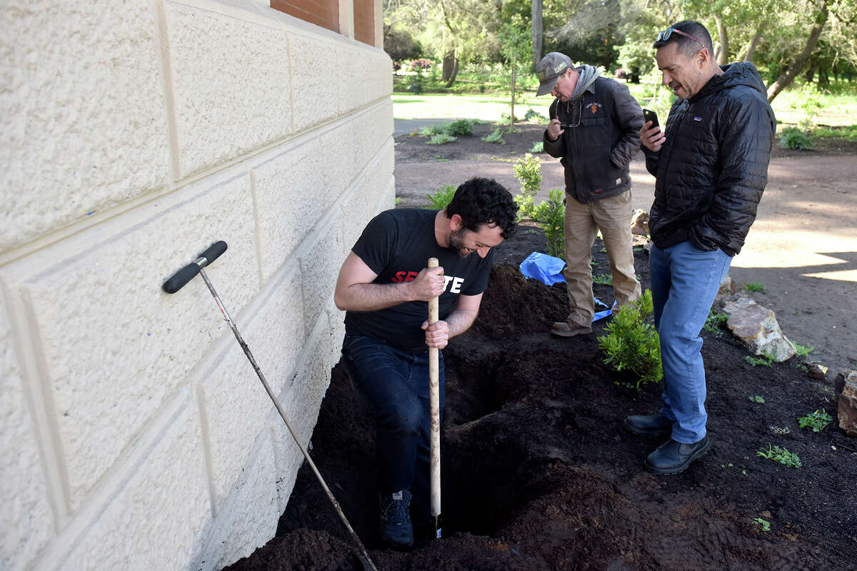 SFGATE culture editor Dan Gentile digs for buried treasure in Golden Gate Park next to the Powell Street Railway Shelter, on Friday, April 15, 2022.