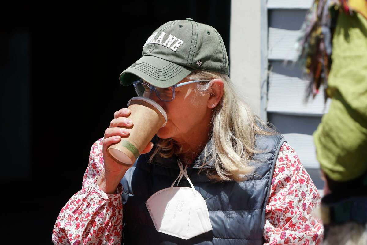 Nancy Sicher of Marshall drinks a beverage from a compostable cup at Toby’s Coffee Bar in Point Reyes Station. More restaurants in Marin County will need to move to compostable foodware becaues of a new ordinance.