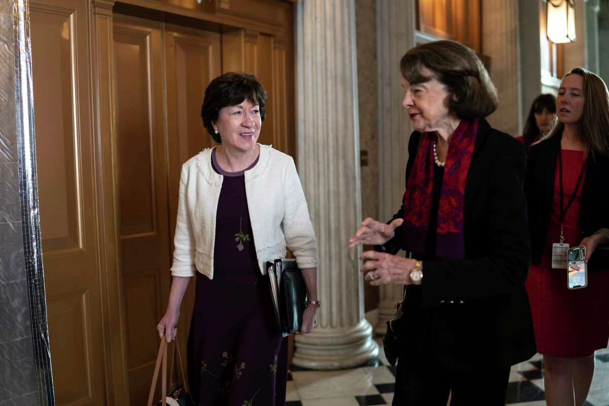 Sen. Susan Collins, R-Maine, left, speaks with Sen. Dianne Feinstein, D-Calif., as senators arrive before a procedural vote on the Women's Health Protection Act to codify the landmark 1973 Roe v. Wade decision that legalized abortion nationwide, at the Capitol in Washington, Wednesday, May 11, 2022. President Joe Biden called on Congress to pass legislation that would guarantee the constitutional right to abortion services after the disclosure of a draft Supreme Court opinion that would overturn Roe v. Wade.