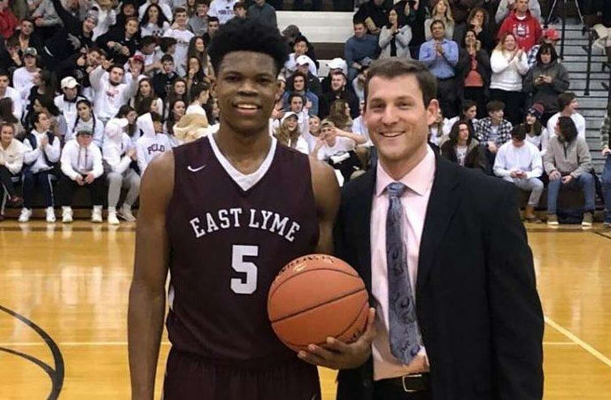 Jeff Bernardi, who coached East Lyme for eight seasons, will become the boys basketball coach at St. Joseph. Bernardi is pictured with Dev Ostrowski, a 2,000 point scorer for the Vikings under Bernardi.