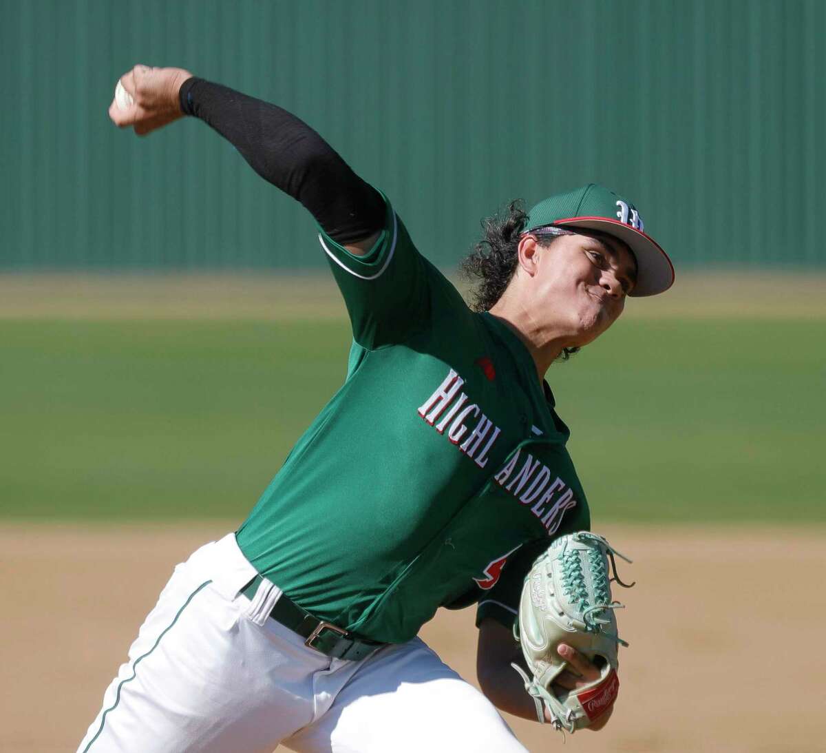 The Woodlands starting pitcher Ethan Coronel (4) throws in the second inning of a high school baseball game at Oak Ridge High School, March 16, 2022.