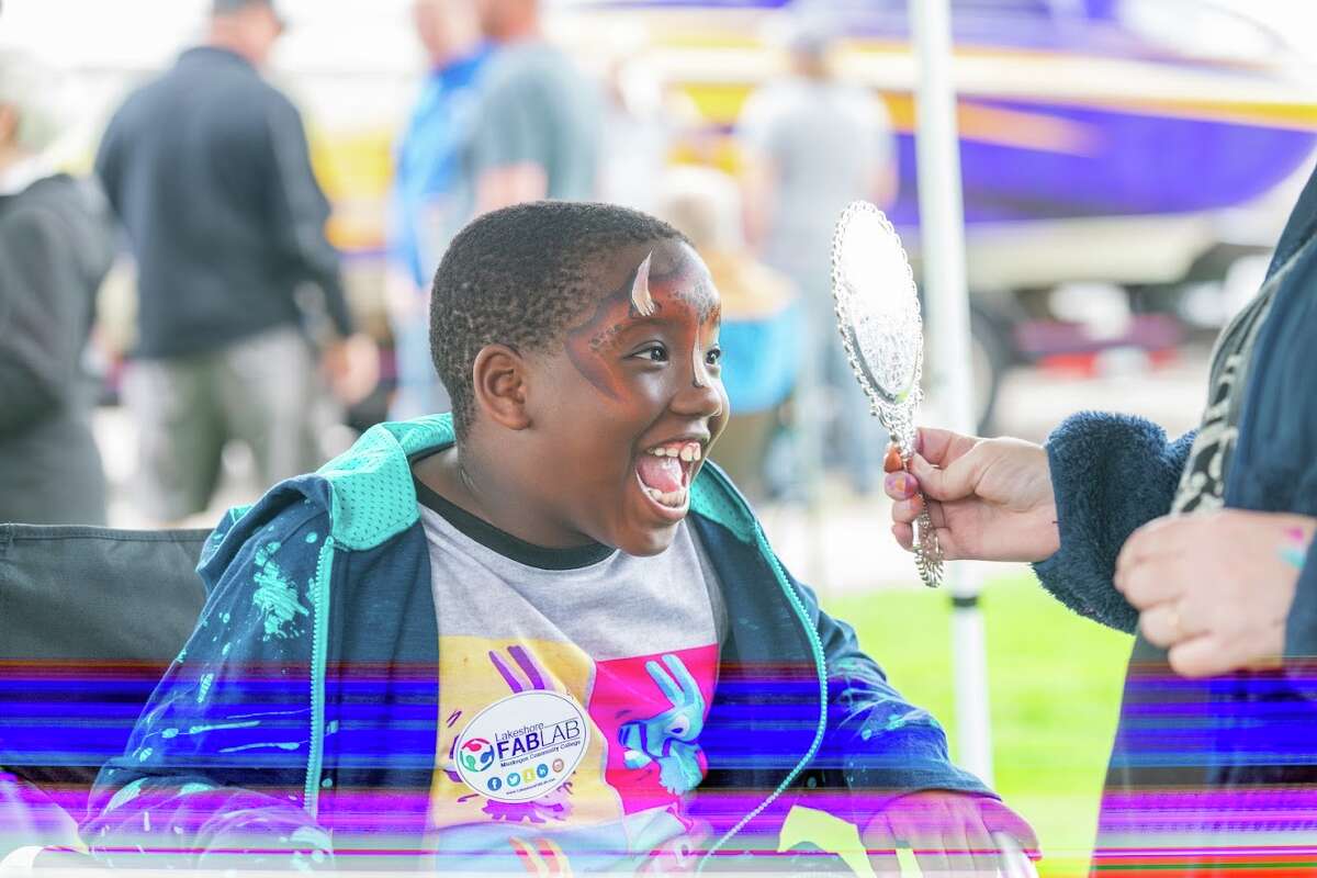 Family activities at Taste of Muskegon have included face painting, axe throwing, balloon animals, a corn maze, a bounce house and a 33-foot obstacle course.