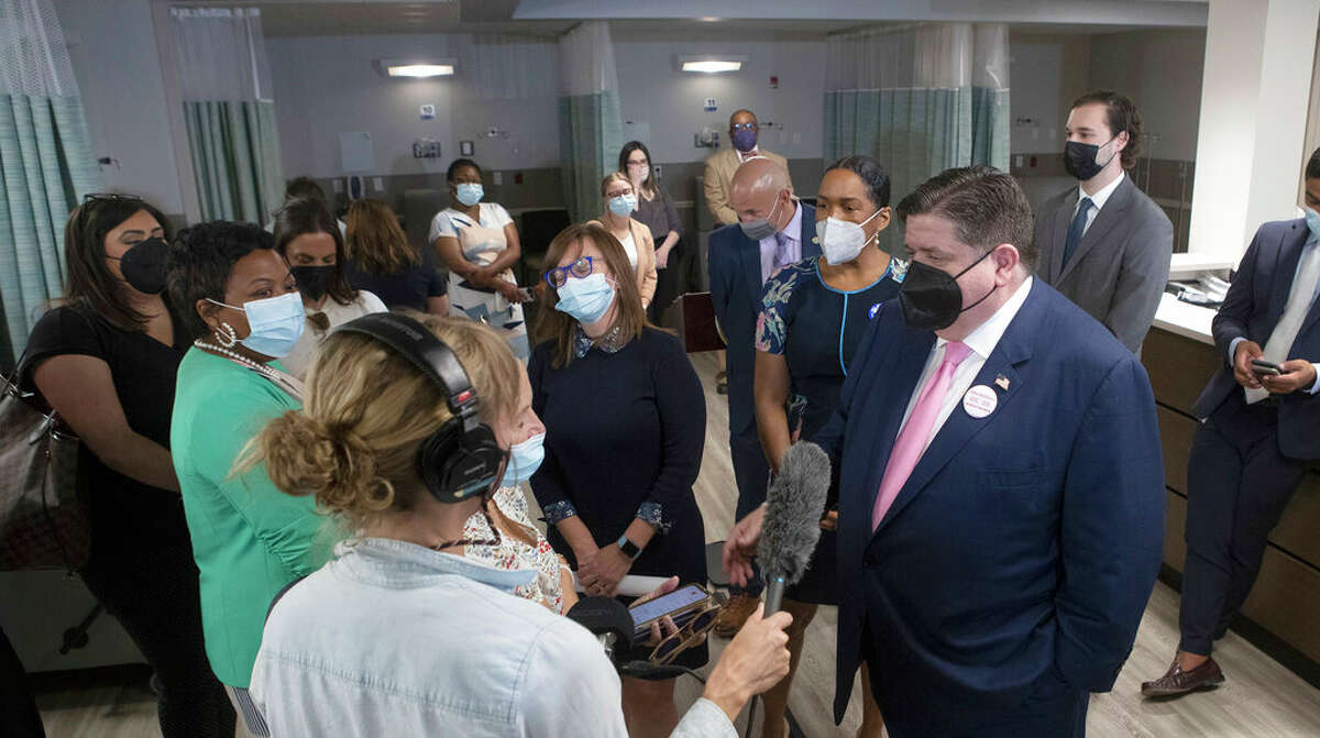 Gov. J.B. Pritzker speaks with members of the media inside the Fairview Heights location of Planned Parenthood. Pritzker and Planned Parenthood leaders also announced plans to scale capacity for Illinois abortion providers preparing for a surge from patients in neighboring states if the Supreme Court upholds a draft opinion to overturn the Roe v. Wade decision that legalized abortion.
