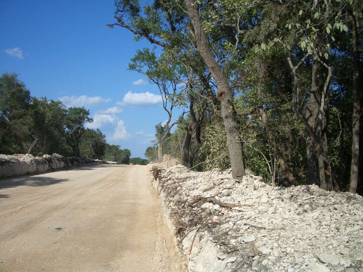 New roadways had to be created as developers started on some of the first subdivisions being built around Hill Country Retreat. 