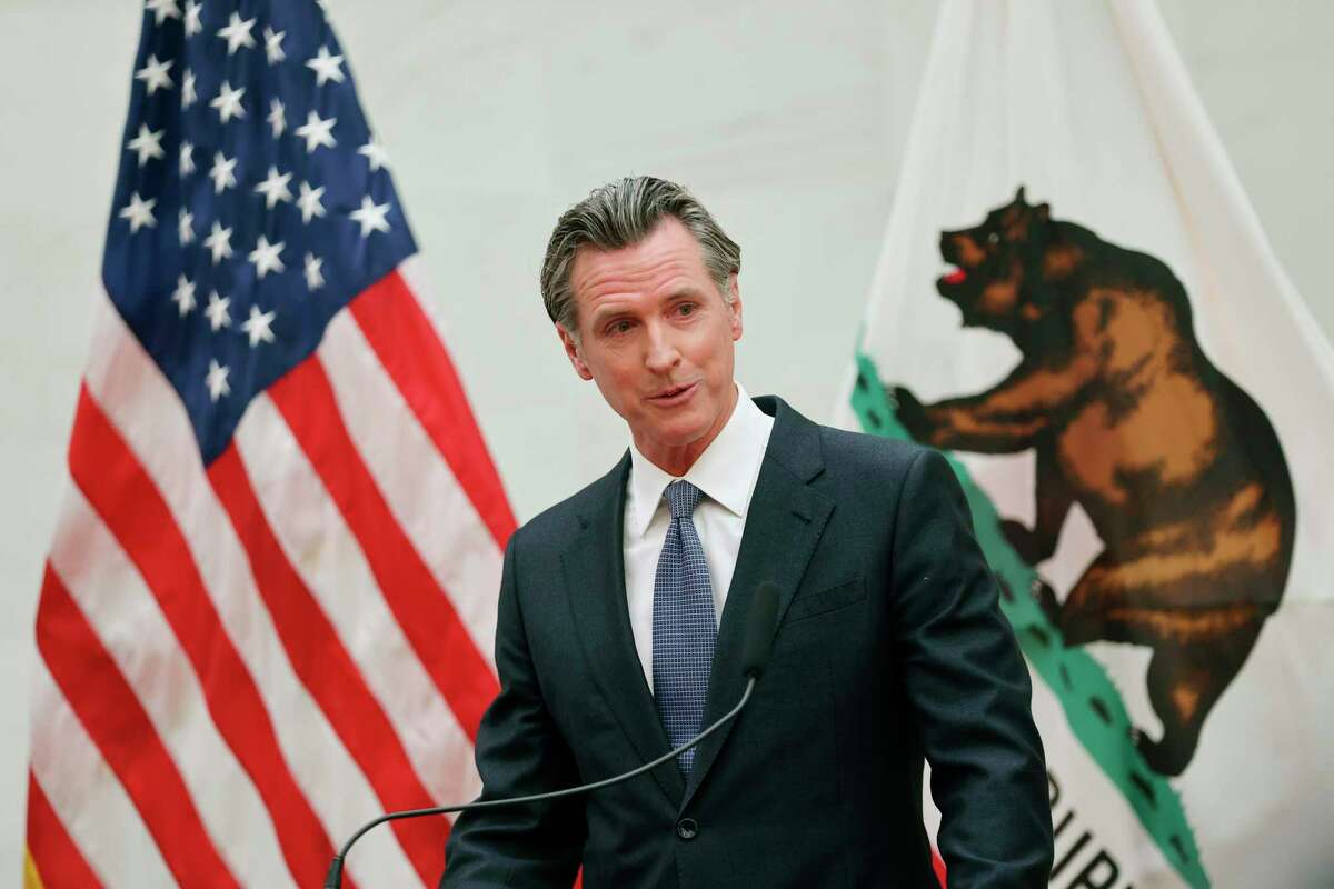 Gavin Newsom plans to lure businesses from states with abortion bans. California Gov. Gavin Newsom attends a press conference at San Francisco City Hall on April 26, 2022
