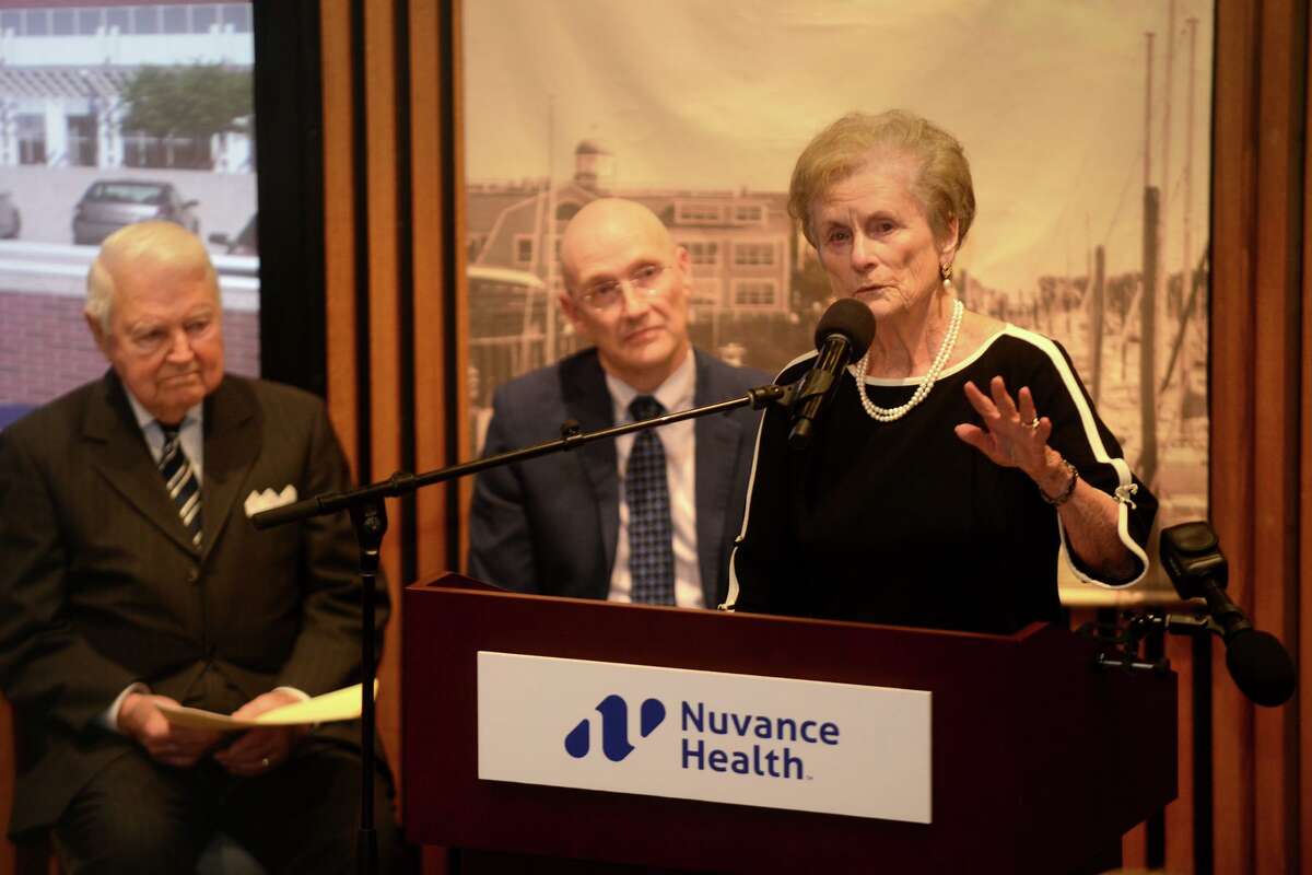 Carol Bauer speaks during a ceremony at Norwalk Hospital on Wednesday, as her husband, George, left, and Norwalk Hospital are making a $20 million donation to the hospital to construct a new 188,000 square-foot Patient Pavilion.
