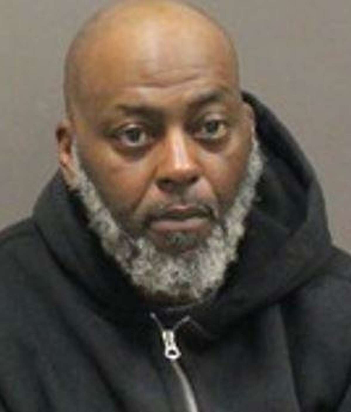 Paul Burruss Sr., 52, of New Haven was charged Wednesday with murder and other offenses related to the deadly shooting of Carlos Gore Jr.