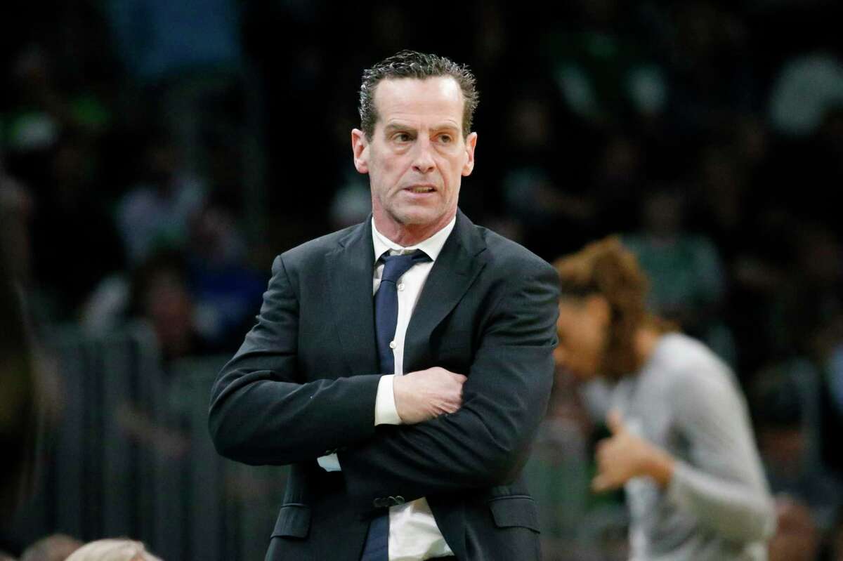 FILE - In this March 3, 2020 file photo, Brooklyn Nets head coach Kenny Atkinson looks on from the sideline during the first half of an NBA basketball game against the Boston Celtics in Boston. The Nets surprisingly split with Atkinson on Saturday, March 7, even as they remain on track for a second consecutive playoff berth. The morning after Atkinson guided the Nets to a rout of San Antonio, the Nets announced that they had mutually agreed to part ways with the fourth-year coach. (AP Photo/Mary Schwalm, File)