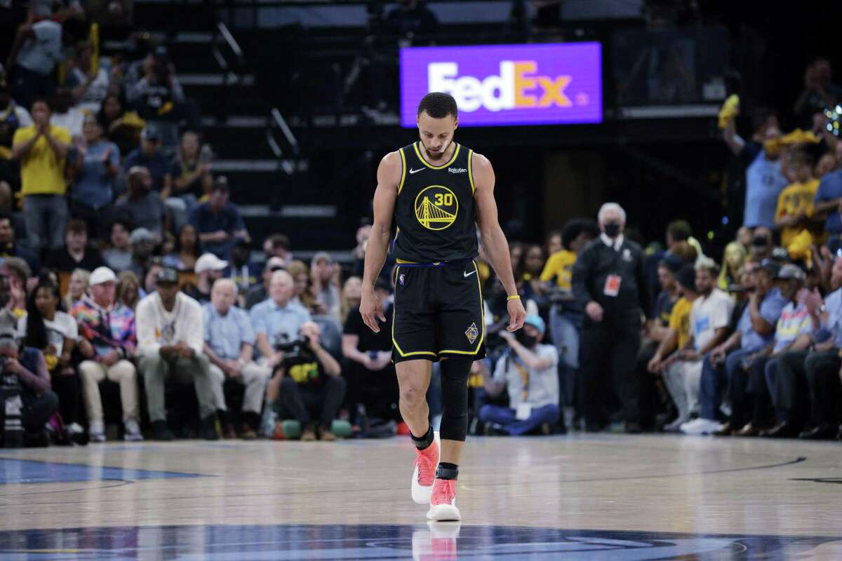 Stephen Curry (30) walks back to the bench In the second quarter as the Golden State Warriors played the Memphis Grizzlies in Game 5 of the Western Conference Semifinals of the NBA Playoffs at Fedex Forum in Memphis, Tenn., on Wednesday, May 11, 2022.