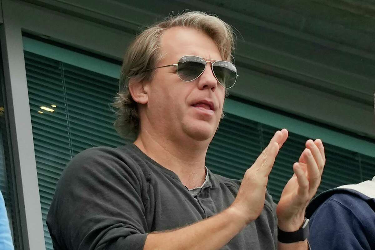 Todd Boehly applauds during the English Premier League soccer match between Chelsea and Wolverhampton Wanderers at Stamford Bridge stadium in London on Saturday, May 7, 2022.