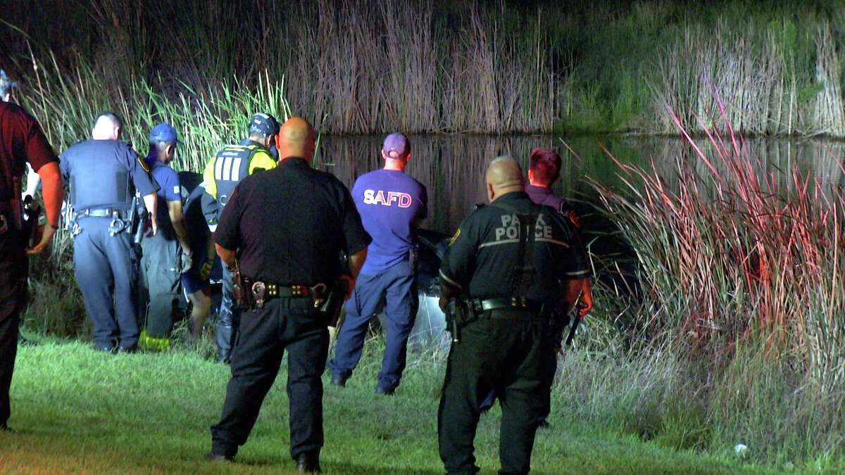 Two people died after a vehicle was found submerged upside down in a creek near New Braunfels Avenue and Research Plaza on May 12, 2022.