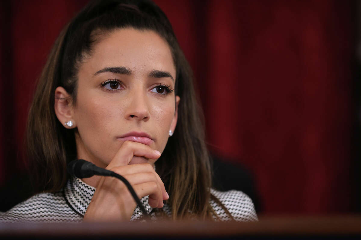 Former U.S. Olympic gymnast Aly Raisman participates in a news conference in the Russell Senate Office Building after testifying before the Senate Judiciary Committee on September 15, 2021 in Washington, DC.