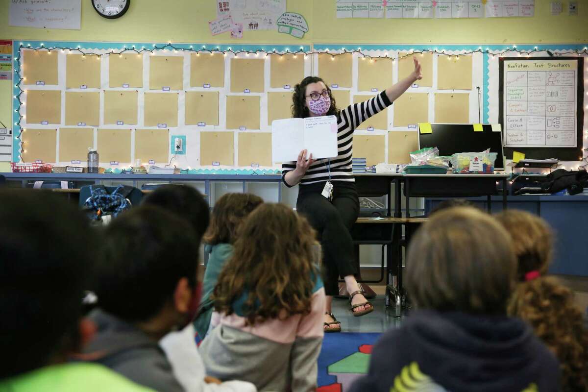 Fourth-grade teacher Erin Flathers teaches math at Argonne Elementary School in San Francisco. The school board is mired in controversy over adding religious holidays.