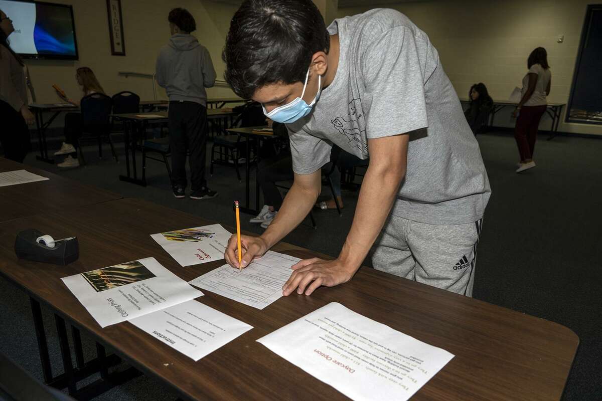 Cypress Ridge High School senior Steven Long works on his budget during a Budget Assessment lesson for his Mathematical Models with Applications class in April. Students combined math and real-life scenarios, applying lessons on personal finance, budgeting, credit and debt, and retirement. During the Budget Assessment, students were tasked with staying at or under budget after selecting an income and family, and then selecting items such as transportation, housing and entertainment.