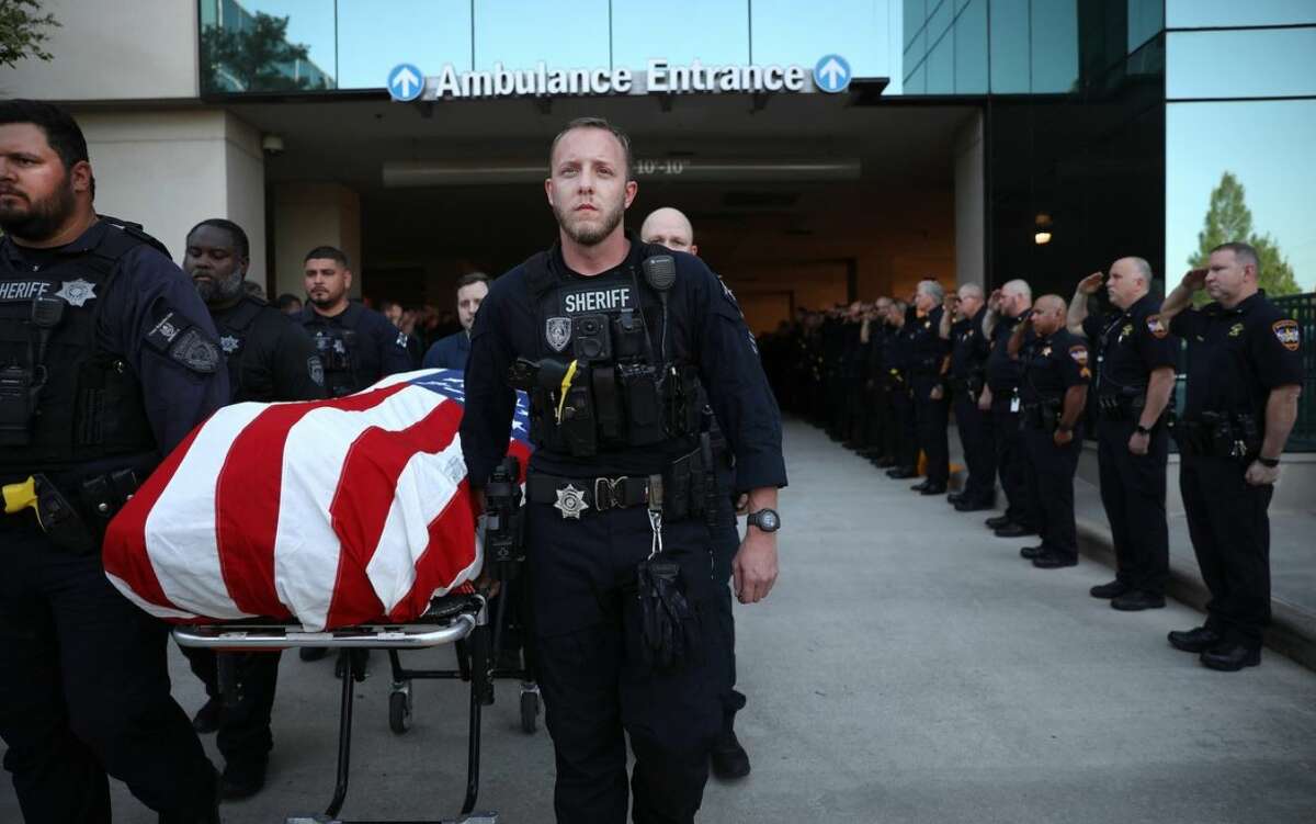 The Harris County Sheriff's Office held a cordon of honor and escort for Deputy Robert Howard, who was killed in a collision on Wednesday, May 11, 2022. 