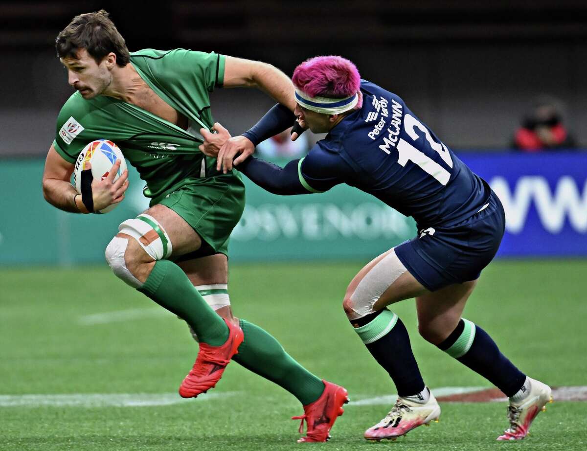 Team Ireland Harry McNulty L and Team Scotland's Ewan Rosser compete during their Pool D match at the HSBC World Rugby Sevens in Vancouver, Canada, April 16, 2022. (Photo by Andrew Soong/Xinhua via Getty Images)