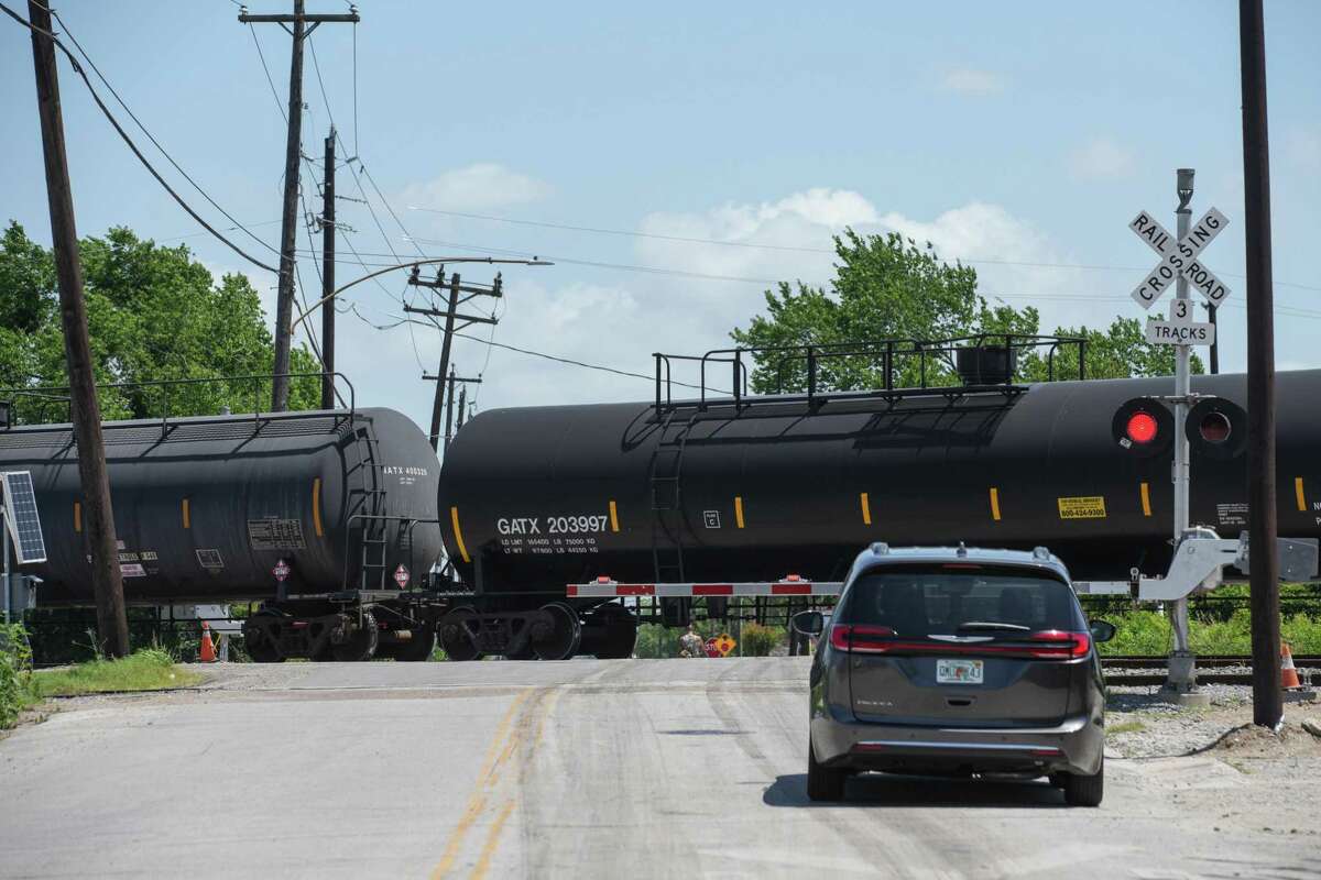A stopped train blocks traffic on Milby in the East End on Tuesday, May 10, 2022 in Houston.