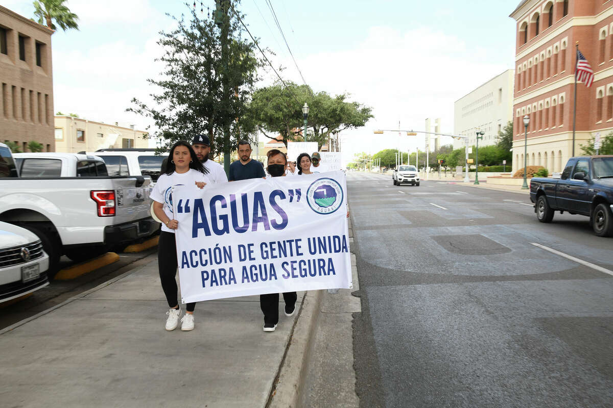 AGUAS! members marched around city hall as they advocated for the city to address the boil water notices that have impacted South Laredo and Las Colonias on highway 359 on Thursday, May 13, 2022.