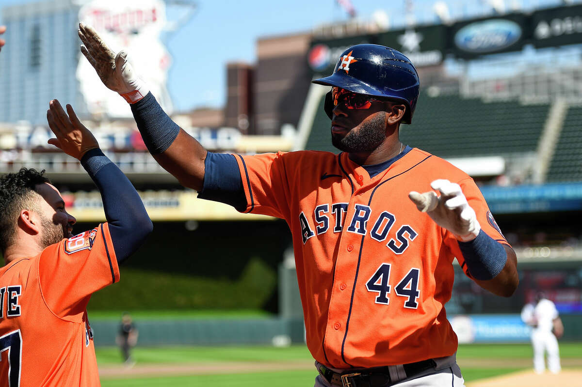 Houston Astros left fielder Yordan Alvarez celebrates after hitting a two-run home run against Minnesota Twins pitcher Josh Winder during the first third of a baseball game, Thursday, May 12, 2022, in Minneapolis. (AP Photo/Craig Lassig)