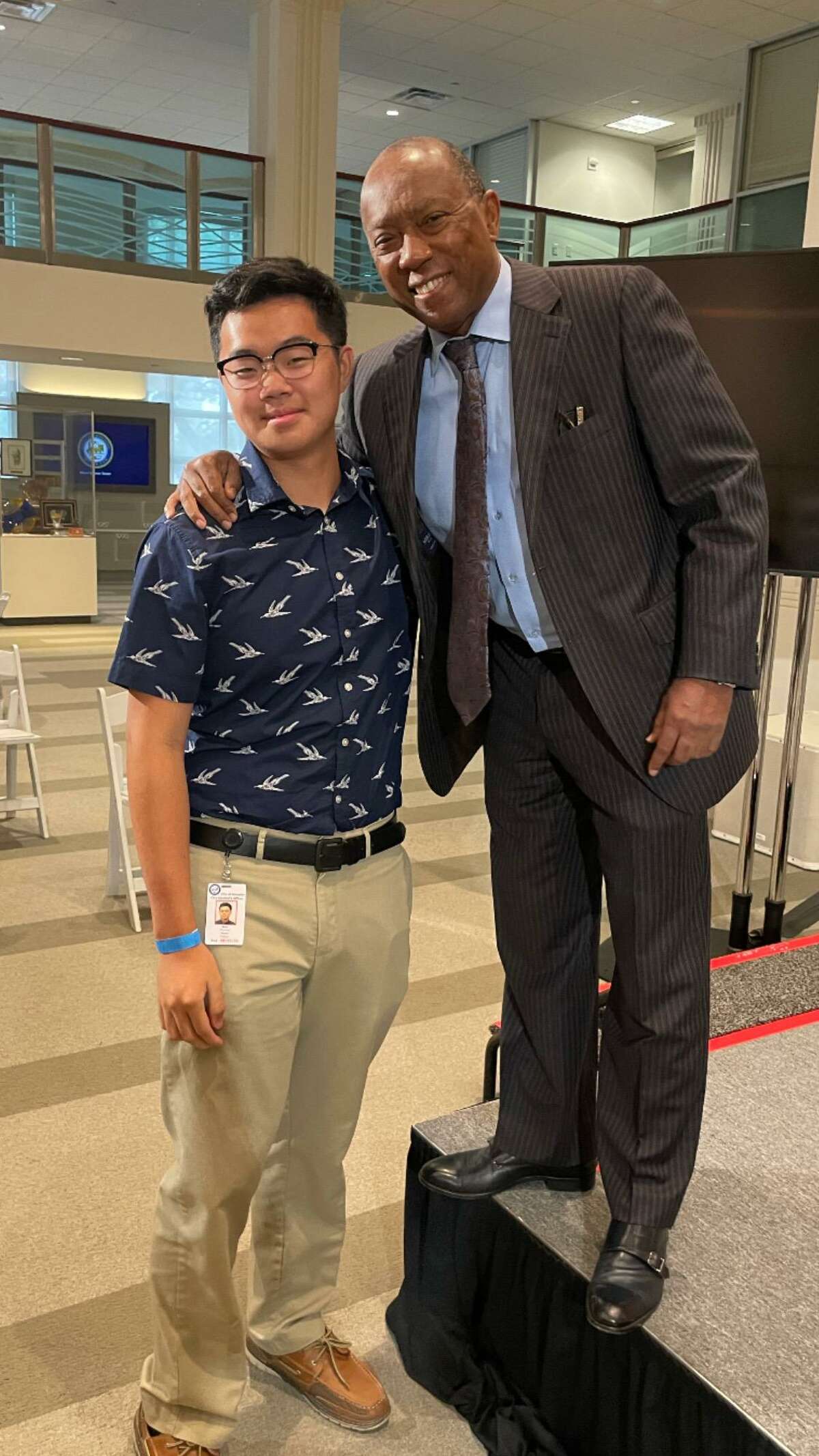 Tommy Wan, a 12th grade student at The Village School, left, poses with Houston Mayor Sylvester Turner at a reception held at City Hall on Wednesday, May 4 that recognized the five scholarship recipients from the city's 30th annual Public Service Recognition Week Essay Contest.