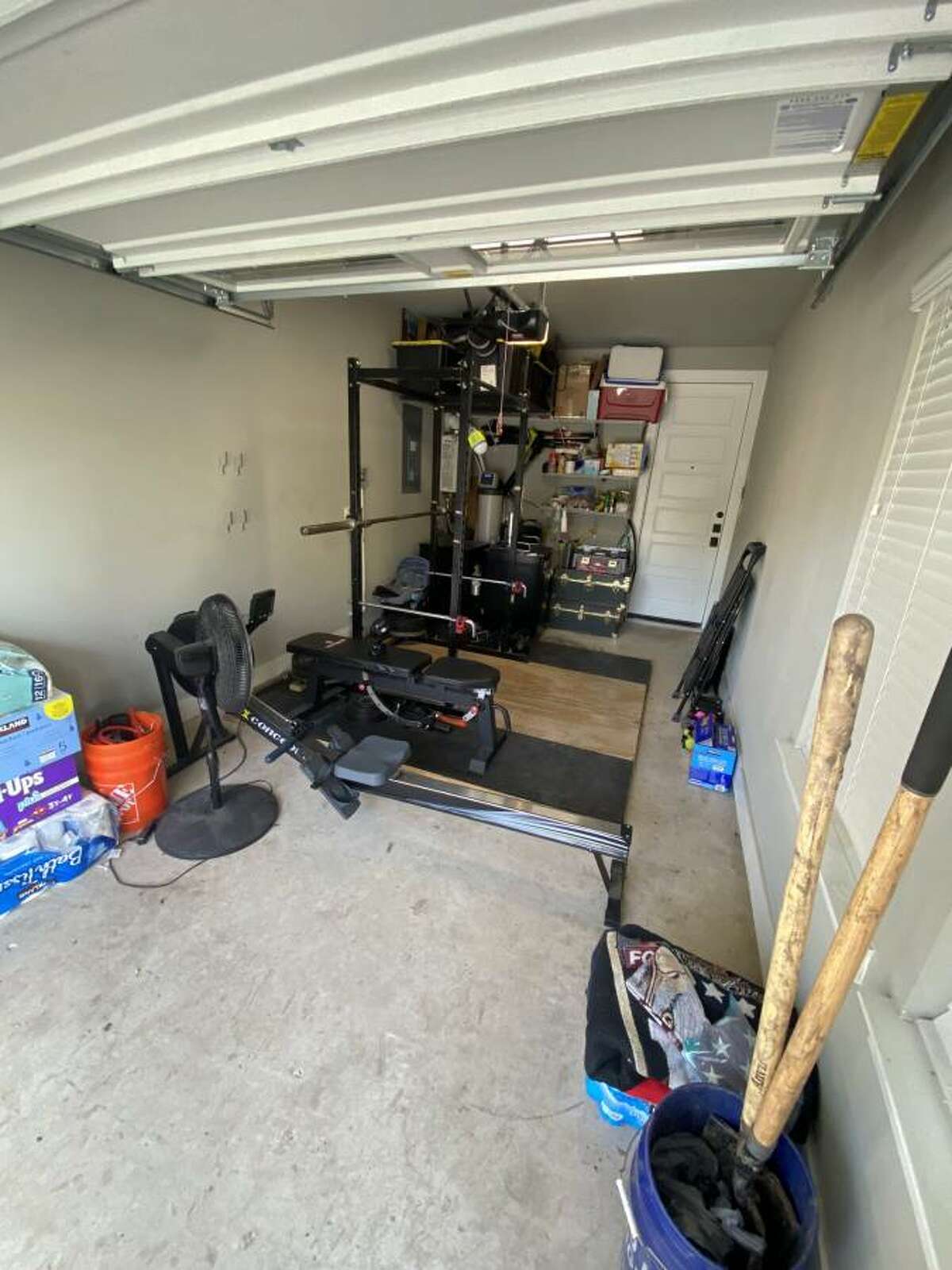 The garage can be used to park your car or as a home gym. 