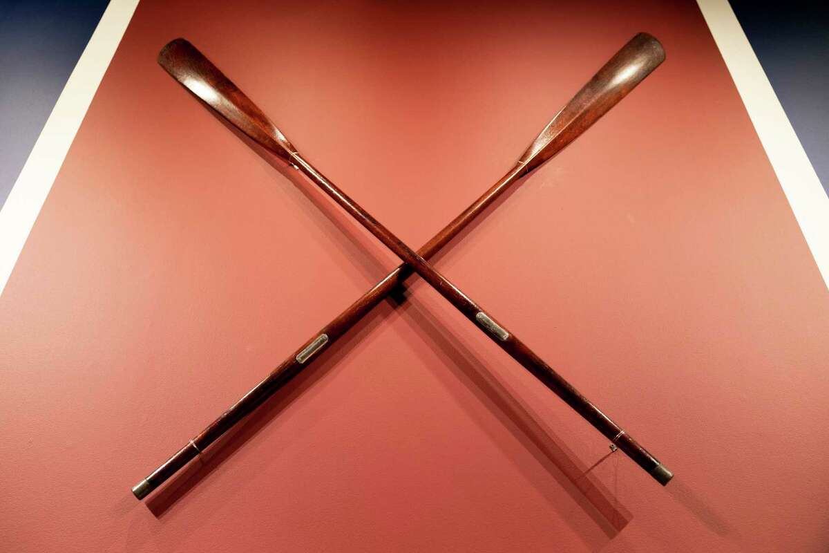 The Harvard-Yale Regatta 1852 Trophy Oars are displayed before an auction on Thursday at Sotheby’s in Manhattan.