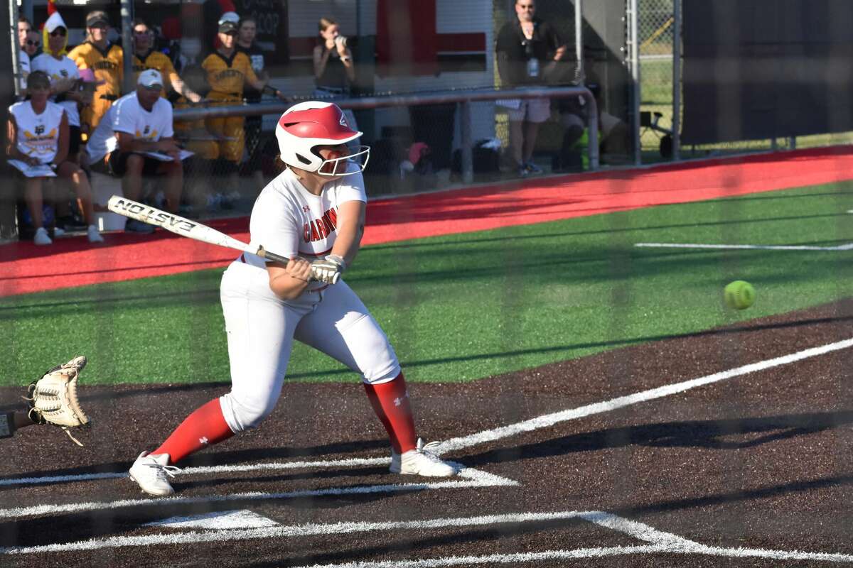Bridge City's Marline Strong takes a swing during the Cardinals regional quarterfinal game against Liberty on Thursday night.