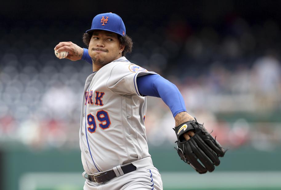 New York Mets left fielder Mark Canha (19) waits for the pitch