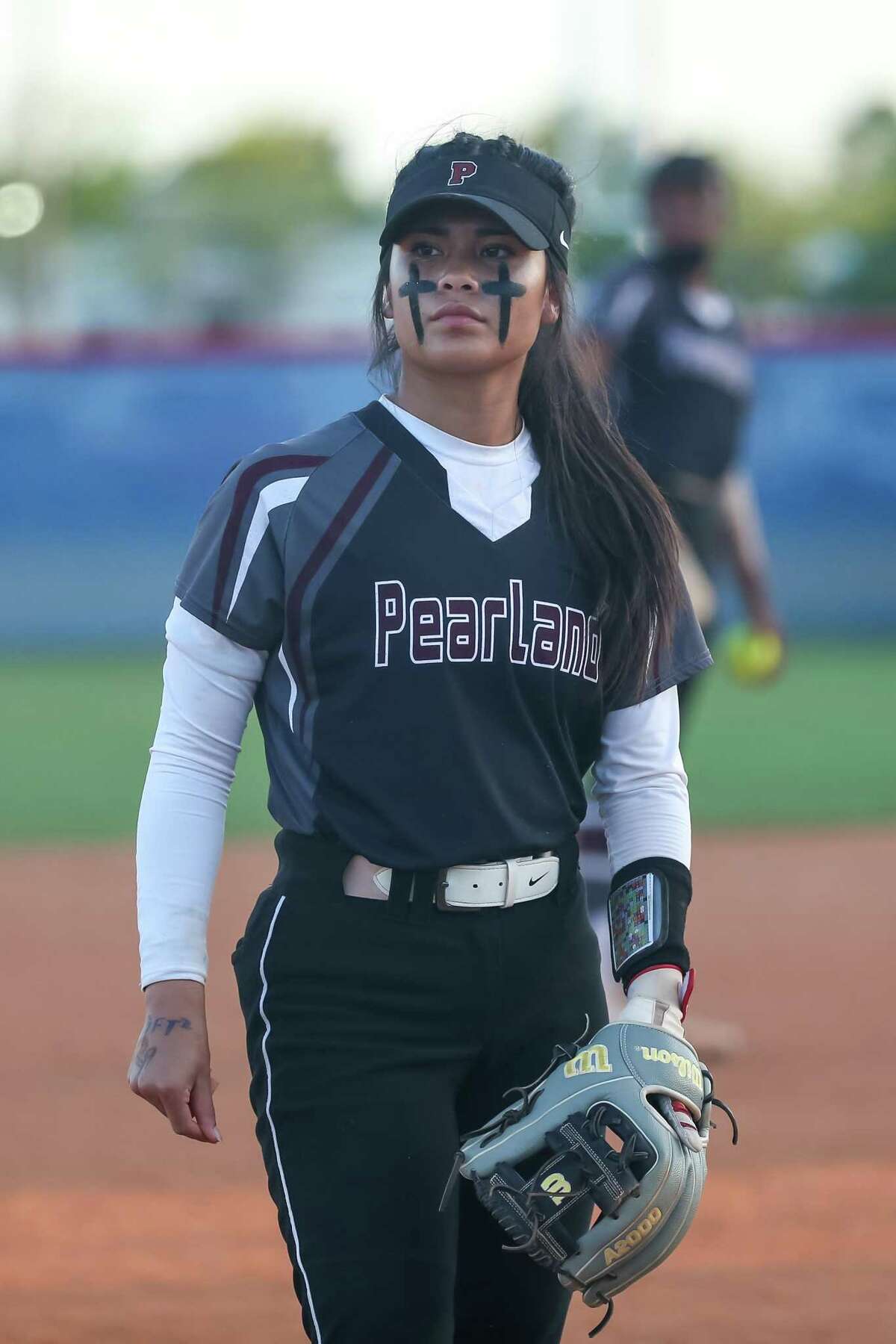 Pearland’s Raenna Liscano (15) looks toward the dugout during the Lady Oilers’ 4-0 win over Clear Springs Thursday night that sends Pearland into the Region 3-6A semifinals.