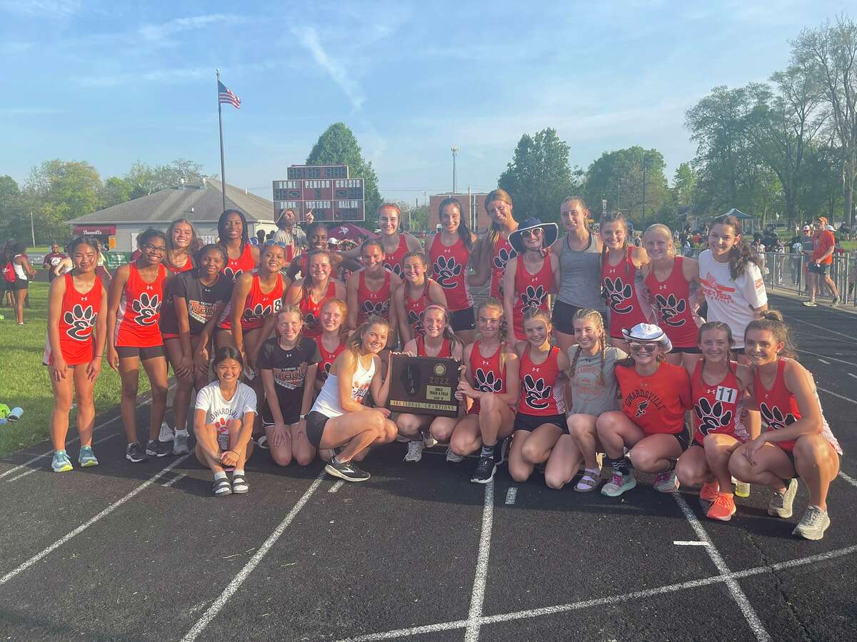 The Edwardsville girls track and field team poses with the Class 3A Danville Sectional championship.