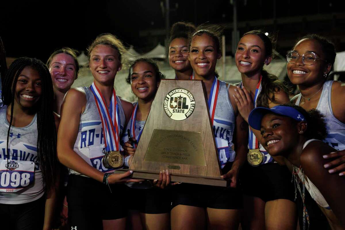 Randolph Ro-Hawks pose for pictures with their new Class 3A state title trophy during the UIL State Track and Field Championships at Mike A. Myers Stadium in Austin, Texas, Thursday, May 12, 2022.
