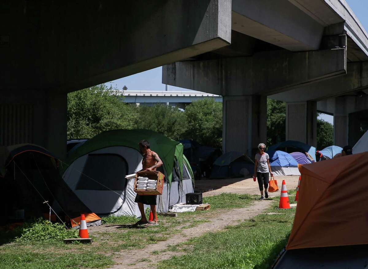 On the morning of Nov. 13, Bob was found dead in a tent beneath the Eastex Freeway, pictured on the left. Photographed on Thursday, May 12, 2022, in Houston.