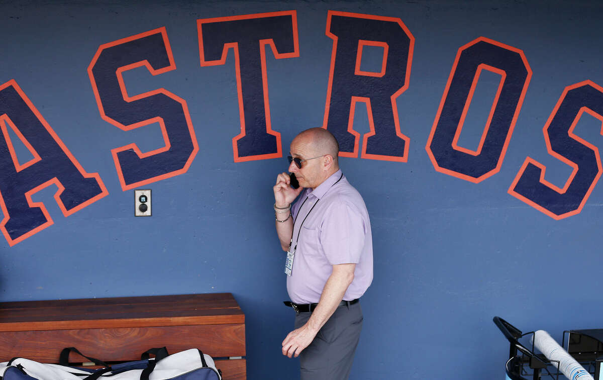 New York Yankees general manager Brian Cashman talks on the phone prior to a Grapefruit League spring training game between the Washington Nationals and the New York Yankees at FITTEAM Ballpark of The Palm Beaches on March 12, 2020 in West Palm Beach, Florida.