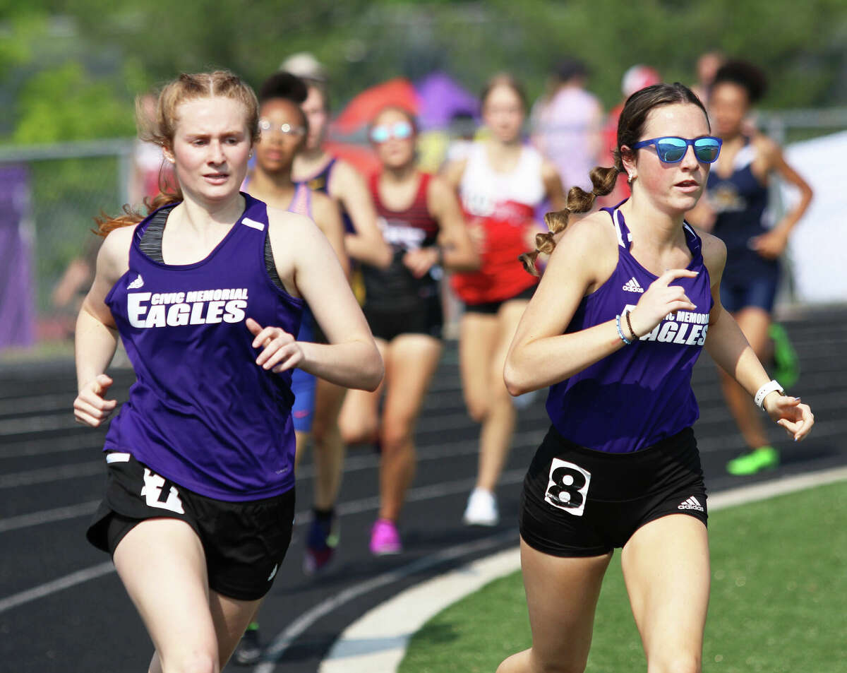 CM's Alyssa Mann (right) and Bella Hannaford lead a pack of runners in the 800 meters on Thursday at the Triad Class 2A Sectional in Troy.