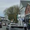 People shop on Main Street in Westport, Conn., on Sunday, May 8, 2022. Several of Connecticut’s largest companies have seen rising demand for goods and services so far in 2022.