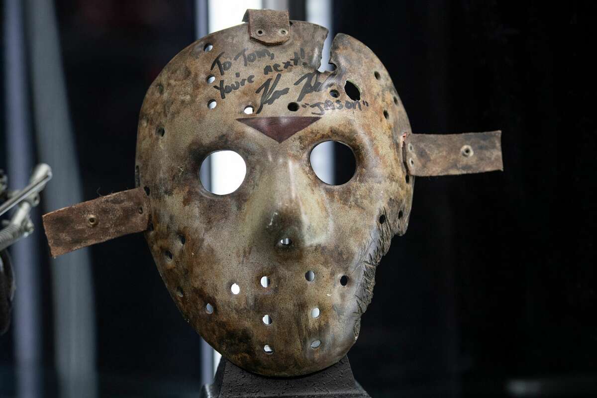 Kane Hodder signed Jason Voorhees hockey mask from the movie "Jason Goes to Hell: The Final Friday" is exhibited during a press preview of Prop Store's Iconic Film & TV Memorabilia on May 14, 2021, in Valencia, California. - Over 1,200 items from Hollywood folklore will go on sale in June and July, including Princess Leia actor Carrie Fisher's "Star Wars: The Empire Strikes Back" script, the custom-made hat worn by Harrison Ford in 1984 action classic "Indiana Jones and the Temple of Doom" and Tom Cruise's sword from "The Last Samurai." (Photo by VALERIE MACON / AFP) (Photo by VALERIE MACON/AFP via Getty Images)