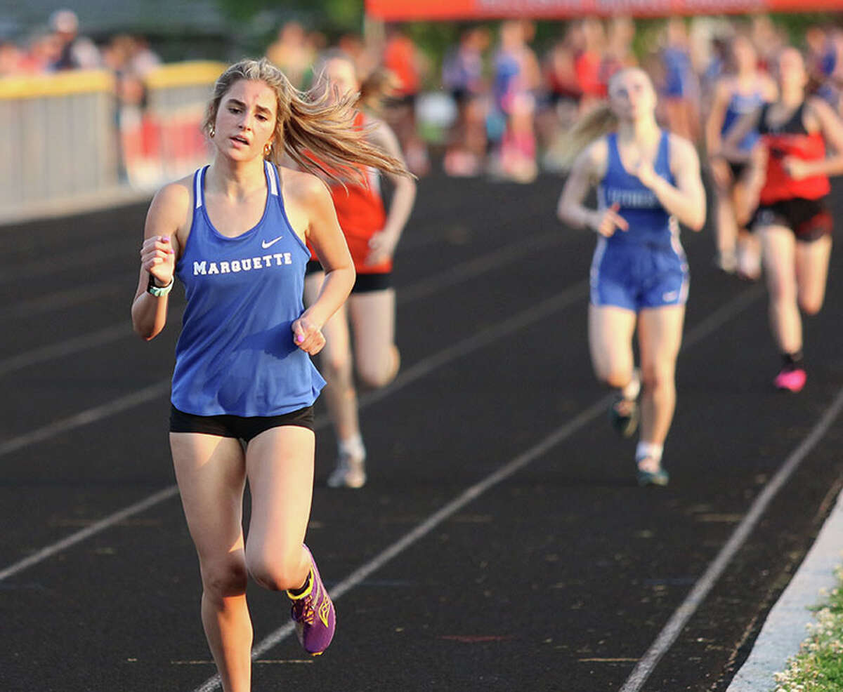 Marquette's Kailey Vickrey leads runners to the finish in the 800 meters on Thursday at the Gillespie Class 2A Sectional. Vickrey finished second to qualify for state.