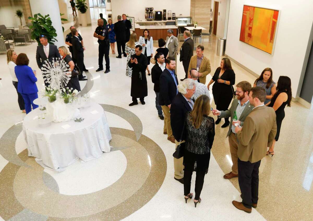 Visitors enjoy refreshments in the spacious new lobby and patient welcome area of Memorial Hermann The Woodlands Medical Center’s new $250 million dollar campus expansion, Thursday, May 12, 2022, in The Woodlands. The new expansion, which add 351,636 square feet to the hospital along with add four new operating rooms, covers cardiac, euro, oncology and digestive care.