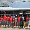 Dr. Nichols, husband and friends with "Below Deck: Sailing Yacht" crew.